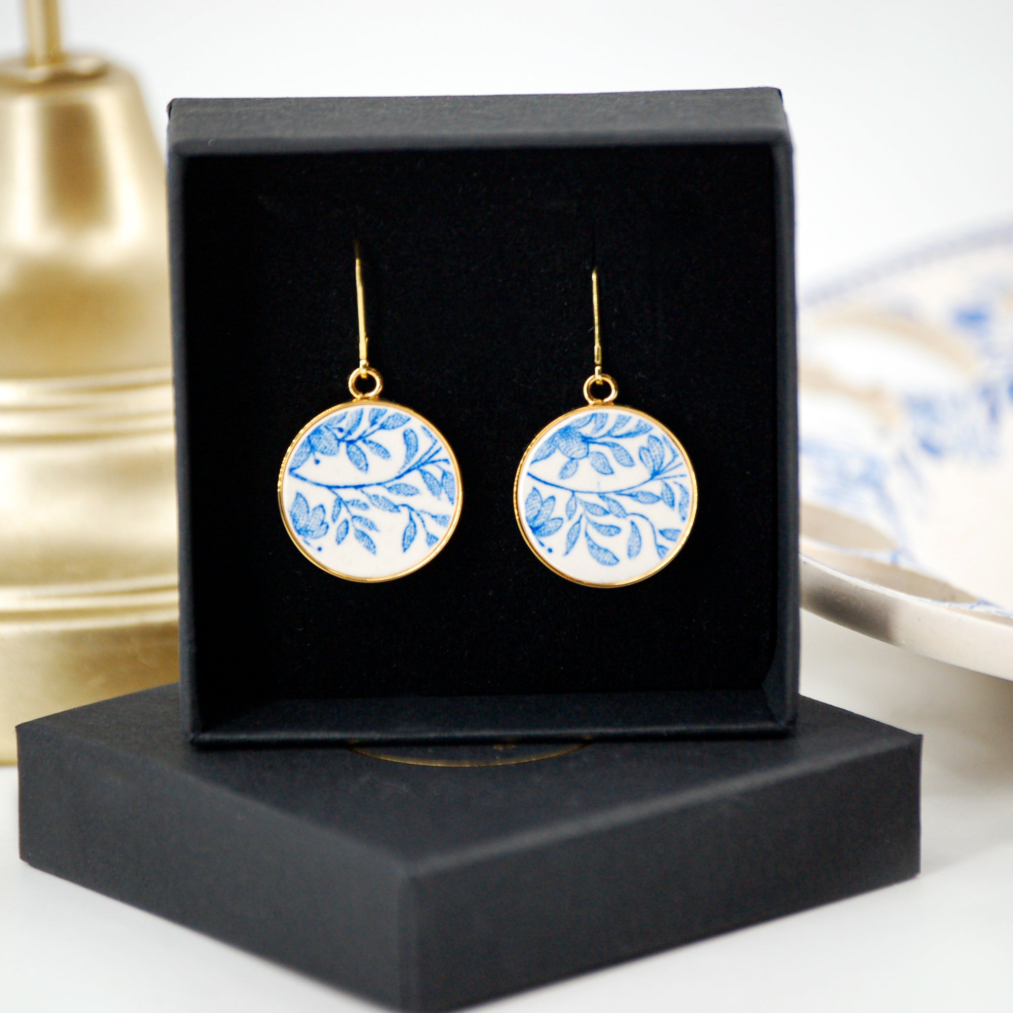 Boucles d'oreilles "Feuillage bleu", finition or