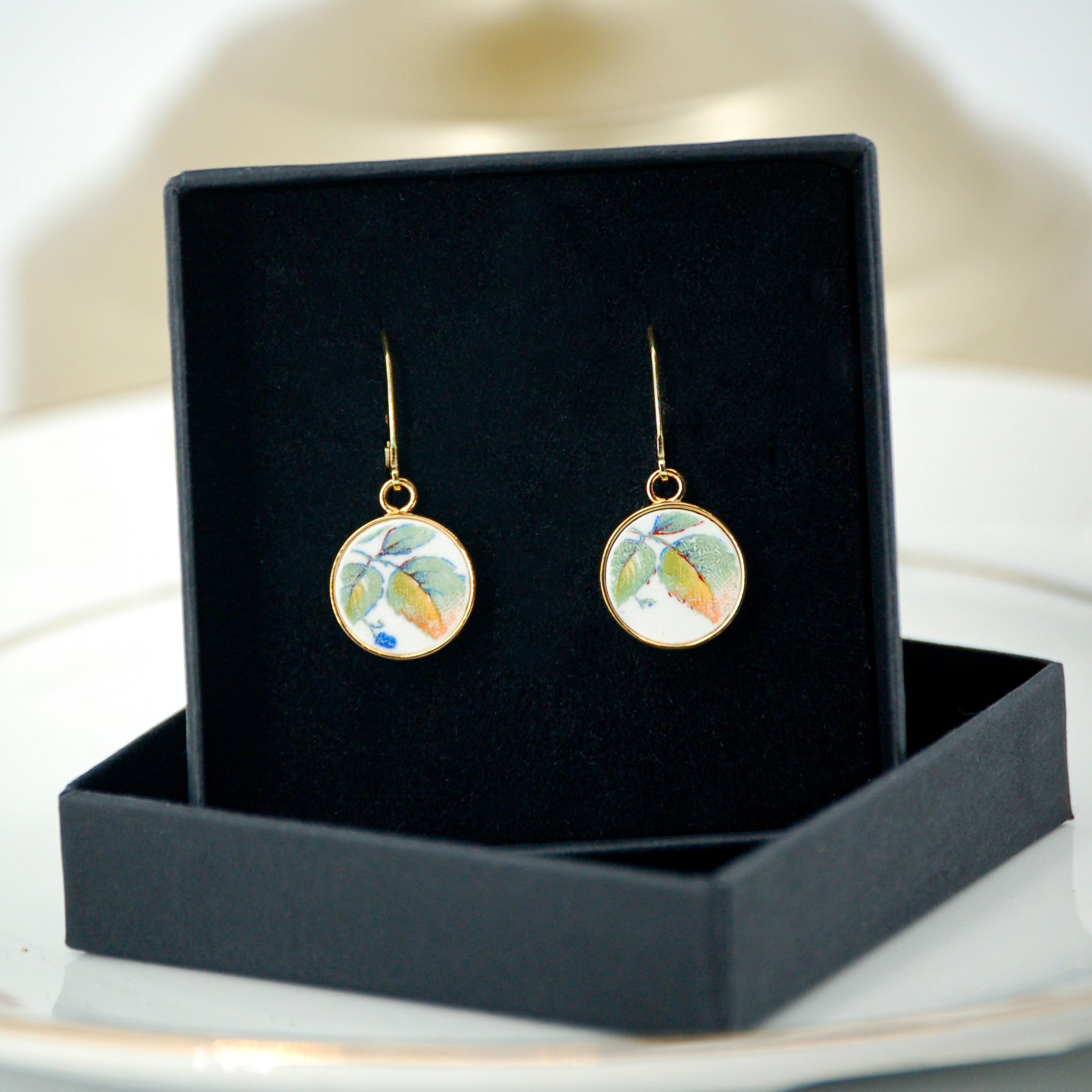 Boucles d'oreilles "Feuilles de baies", finition or