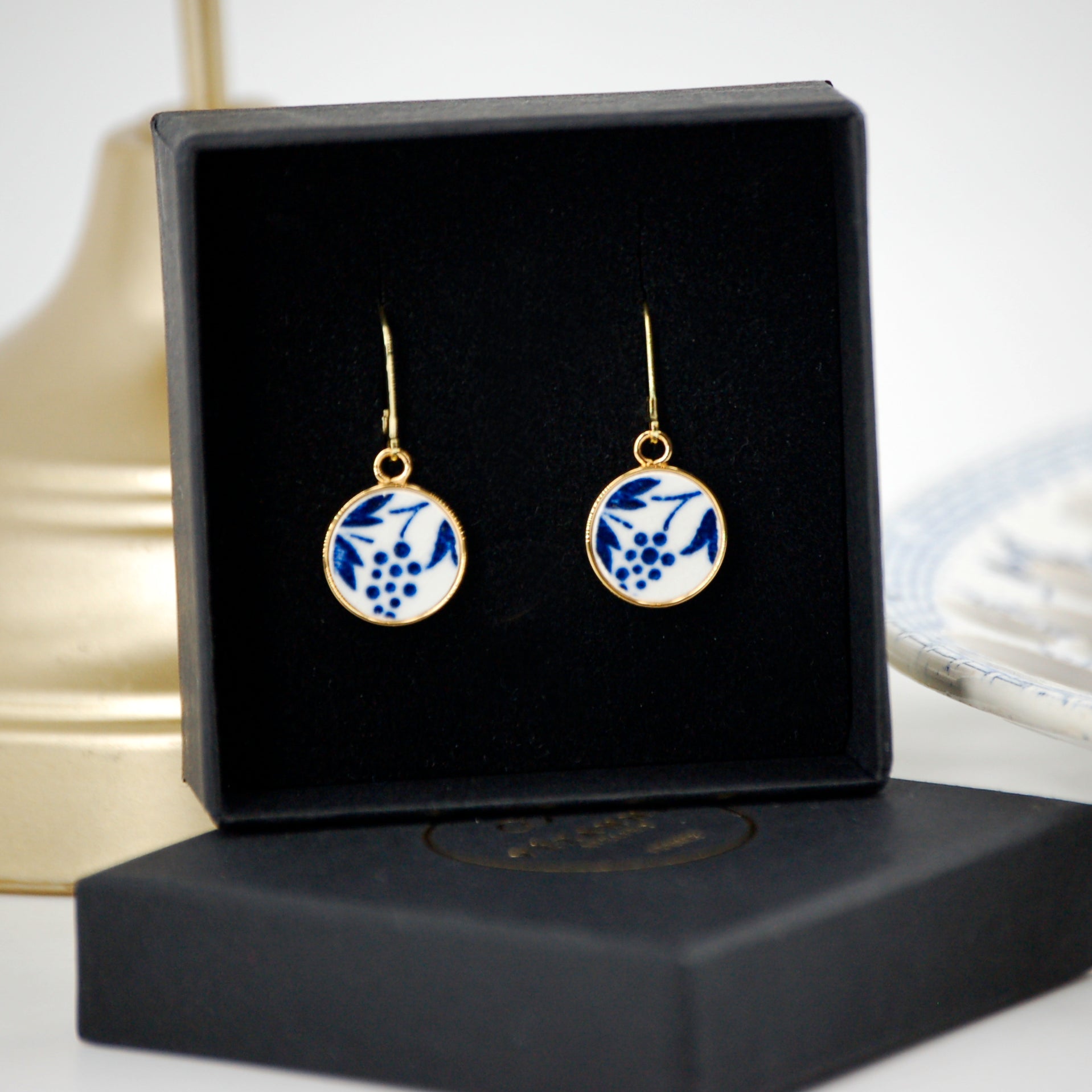 Boucles d'oreilles "Volutes bleues", finition or