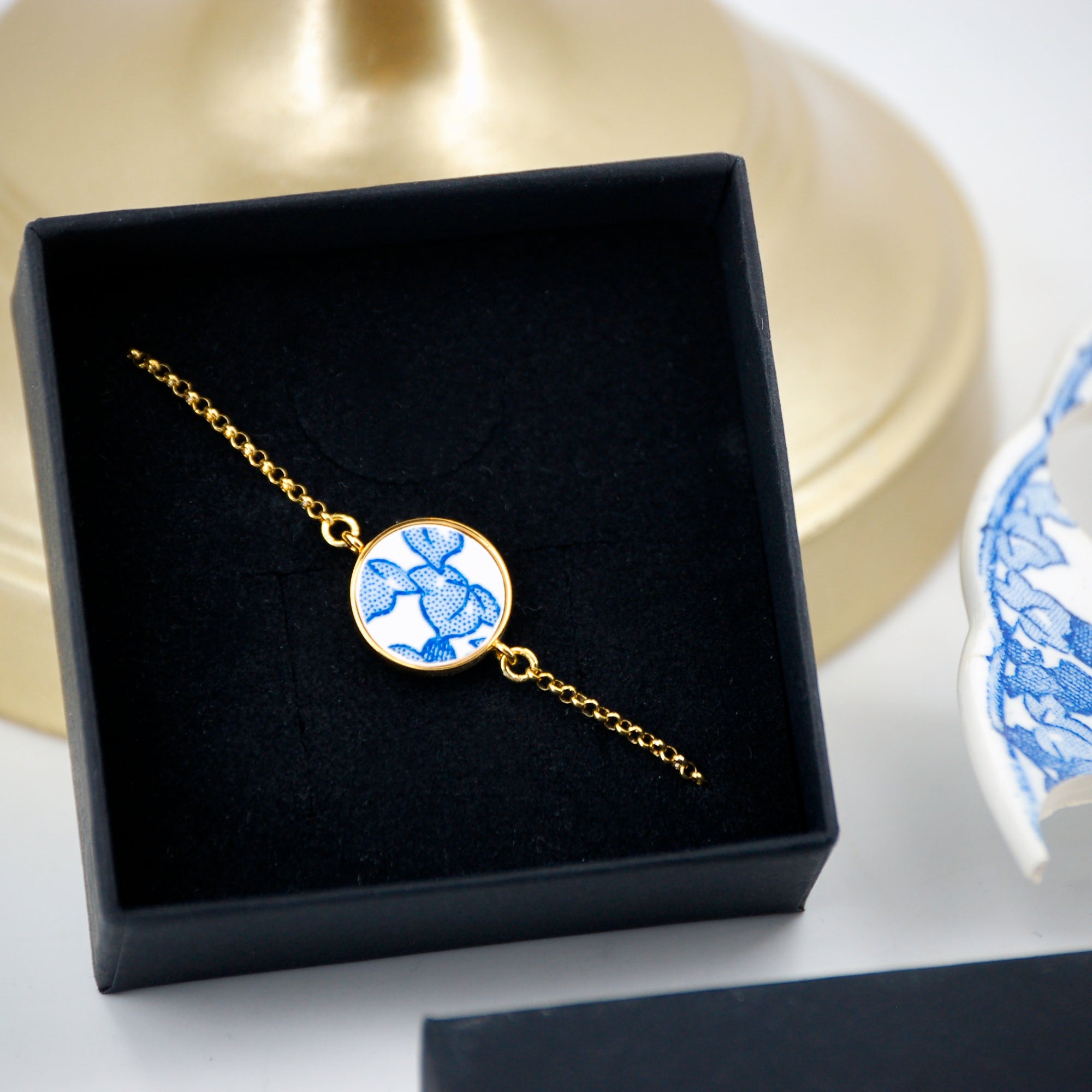 Bracelet ajustable "Feuilles bleues", finition or