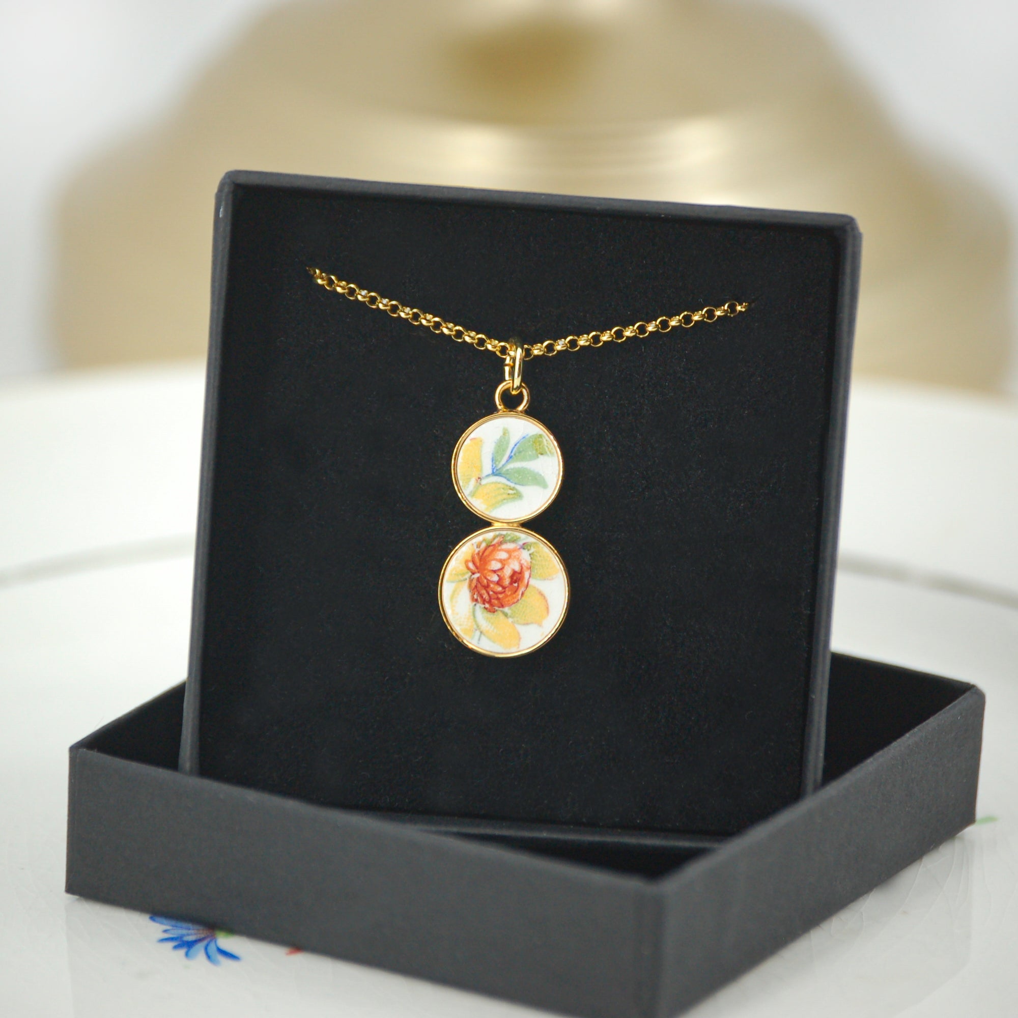 Pendentif "Coeur de fleur jaune", finition or