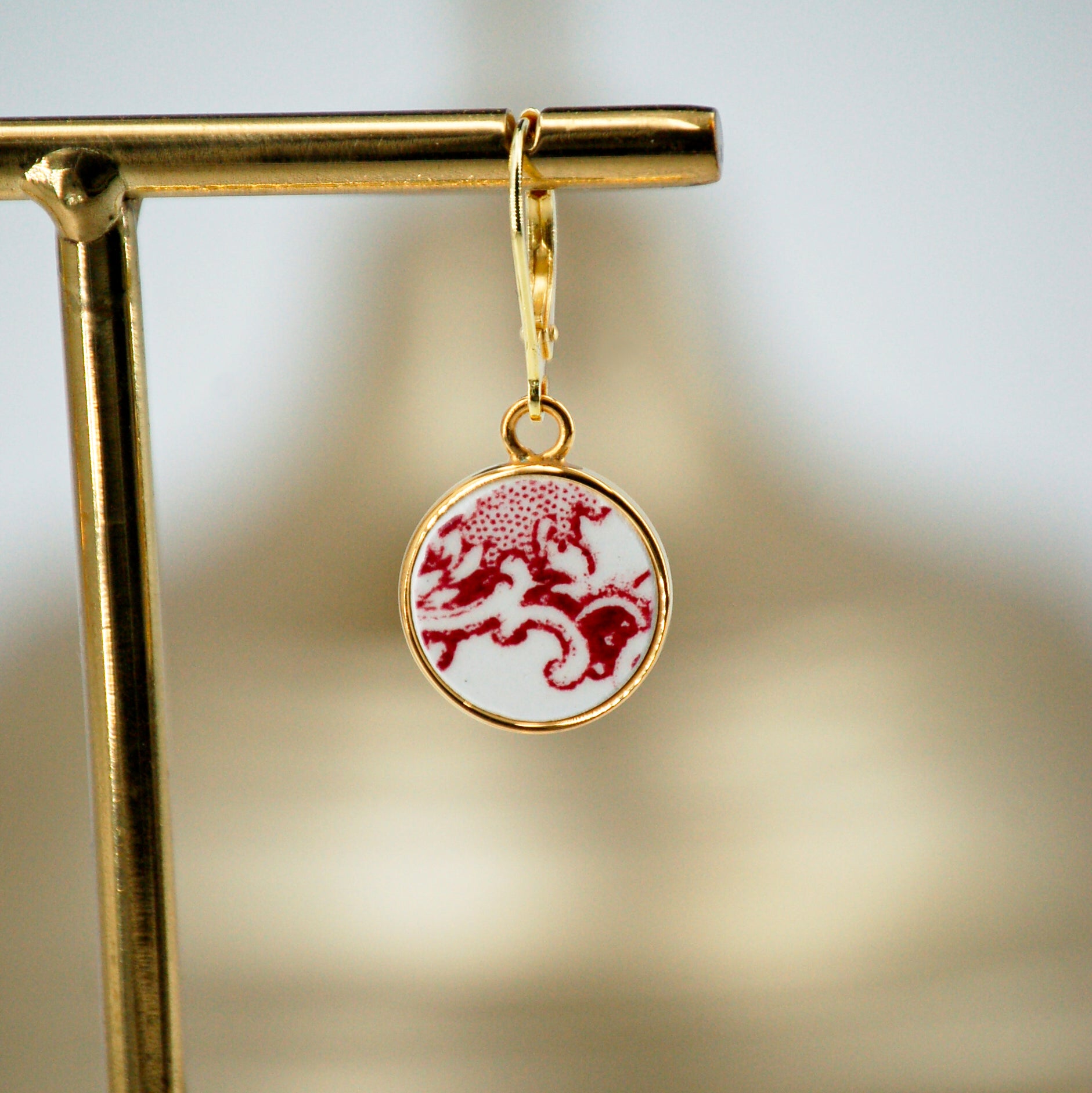 Boucles d'oreilles "Volutes en vieux rose", finition or