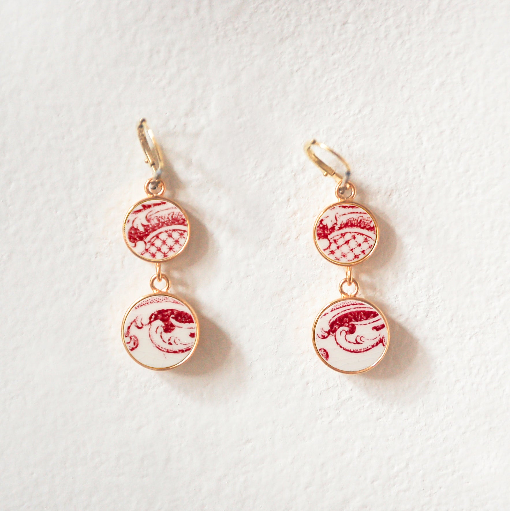 Boucles d'oreilles "Volutes en vieux rose", finition or
