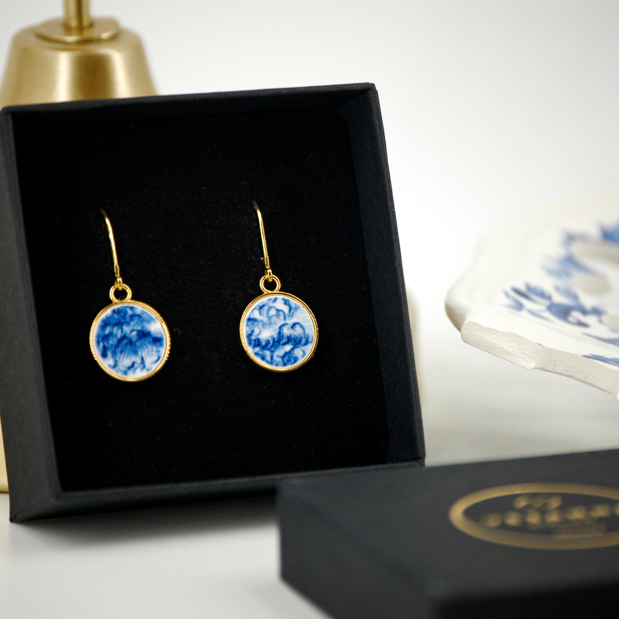 Boucles d'oreilles "Feuillage bleu", finition or