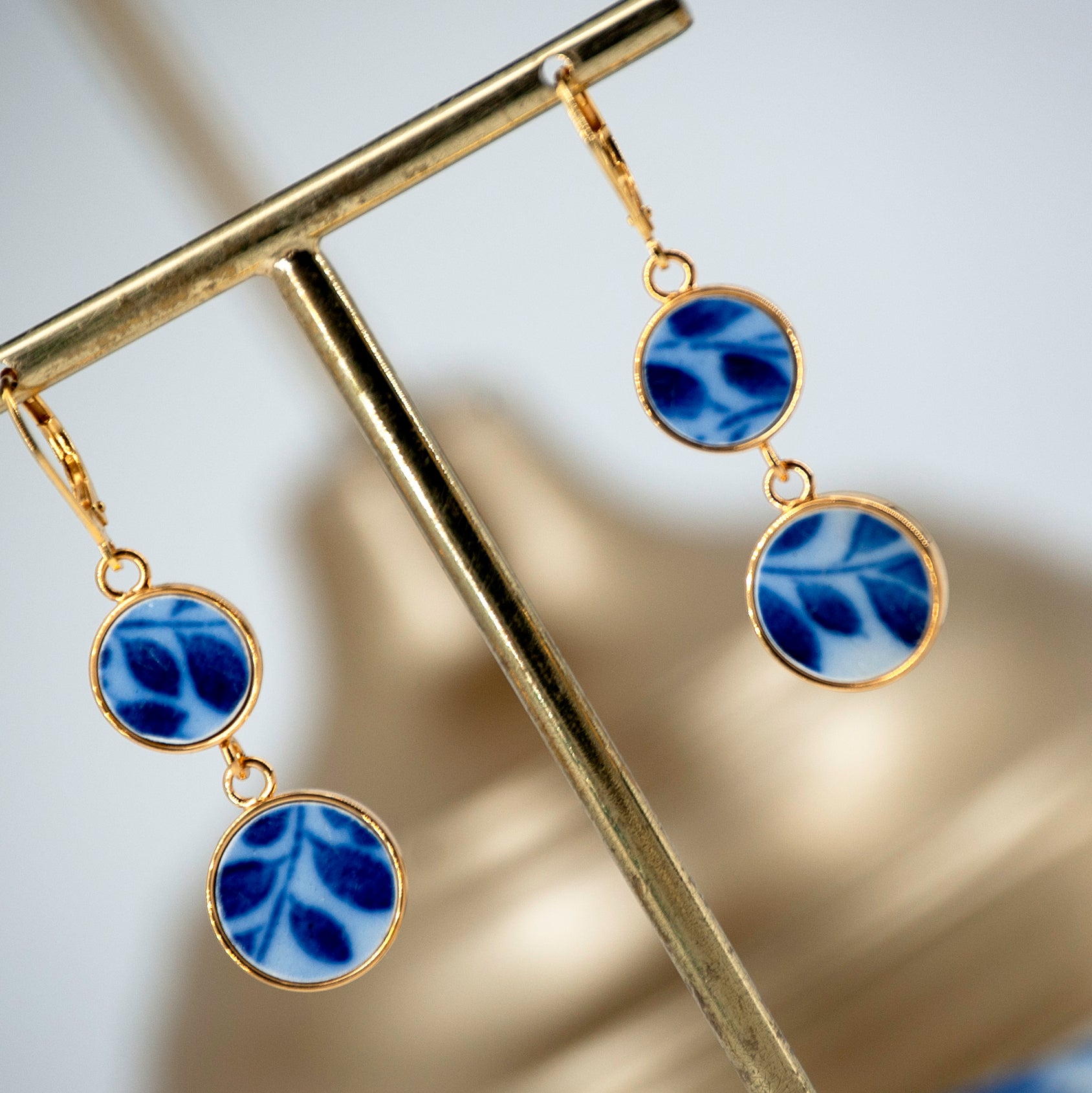 Boucles d'oreilles "feuilles bleues", finition or