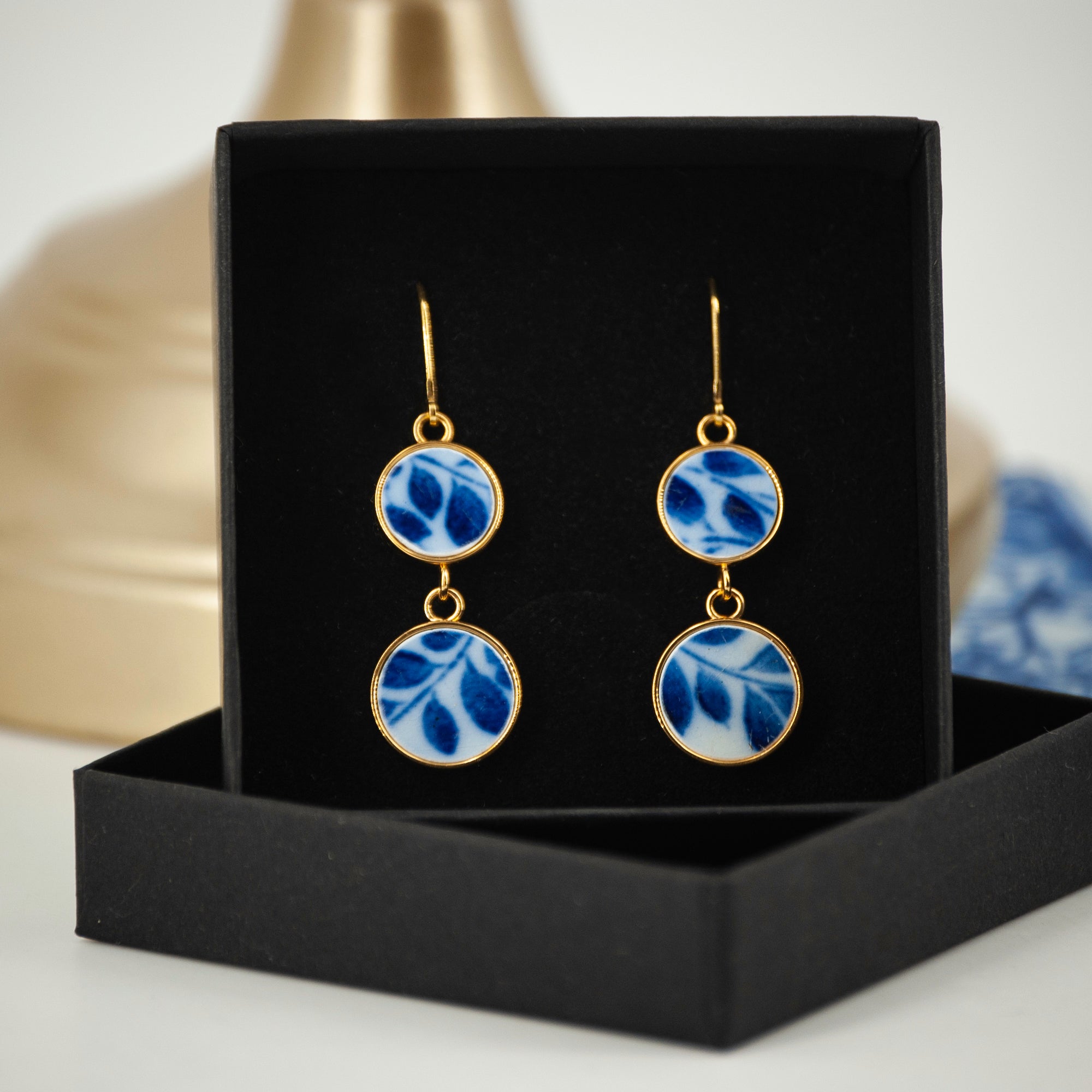 Boucles d'oreilles "feuilles bleues", finition or