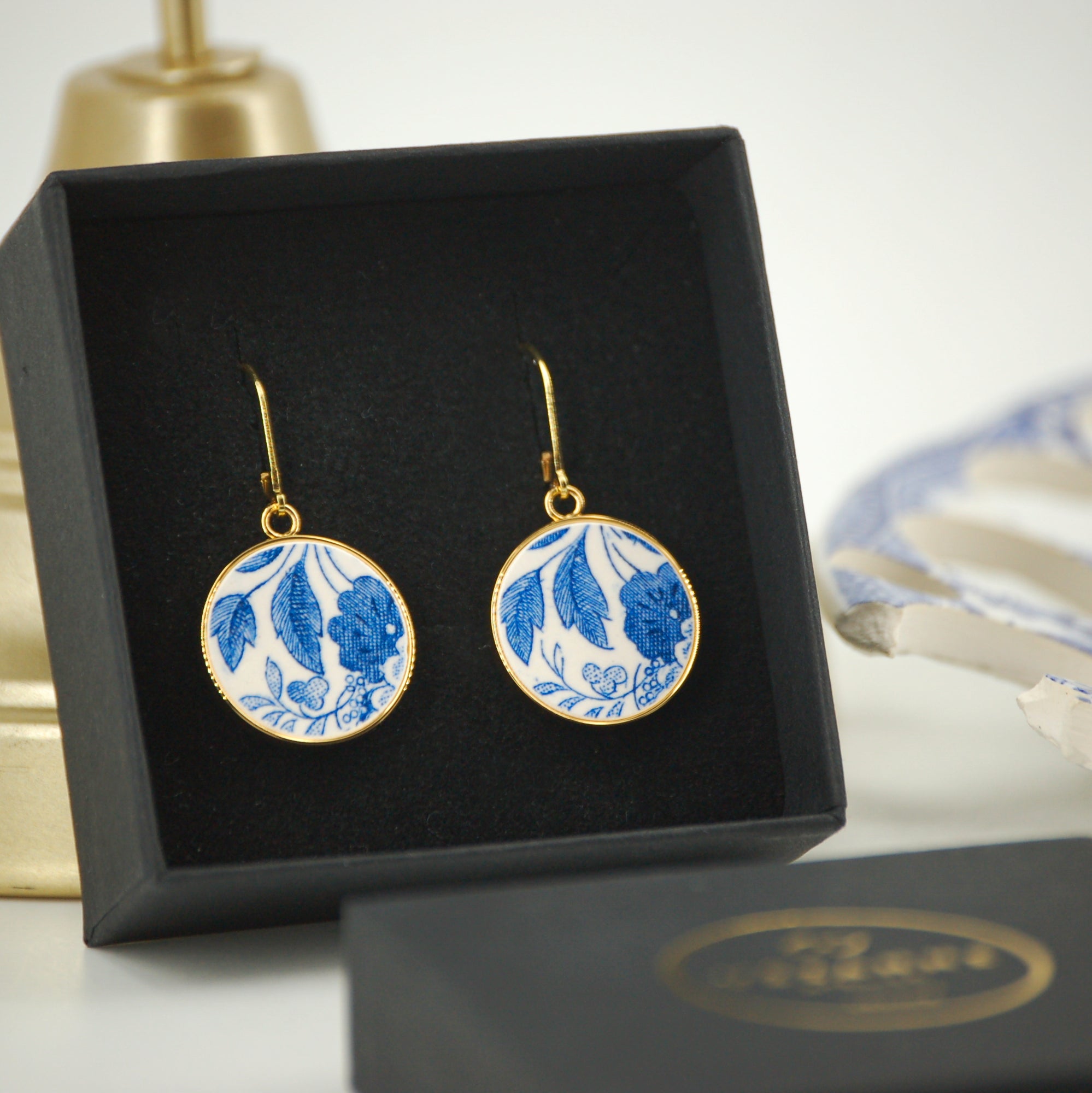 Boucles d'oreilles "Feuillage bleu", finition or