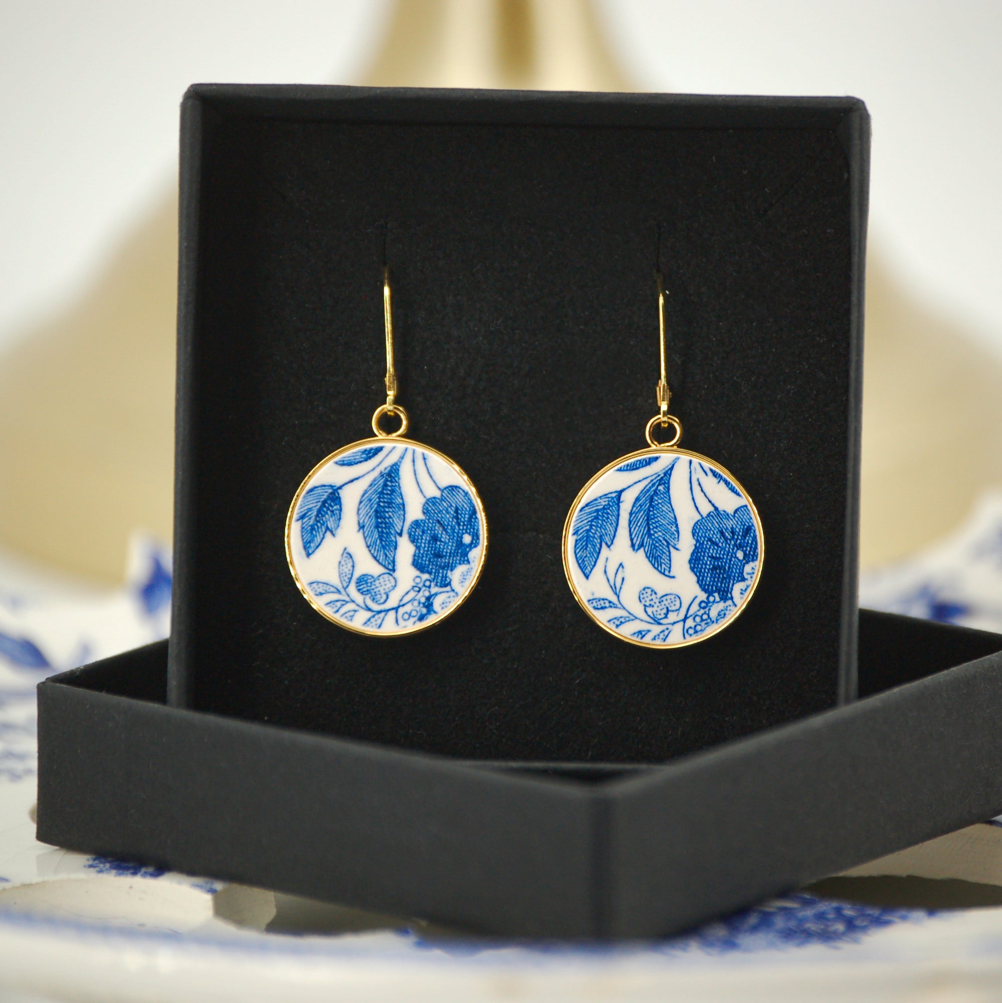 Boucles d'oreilles "Feuillage bleu", finition or