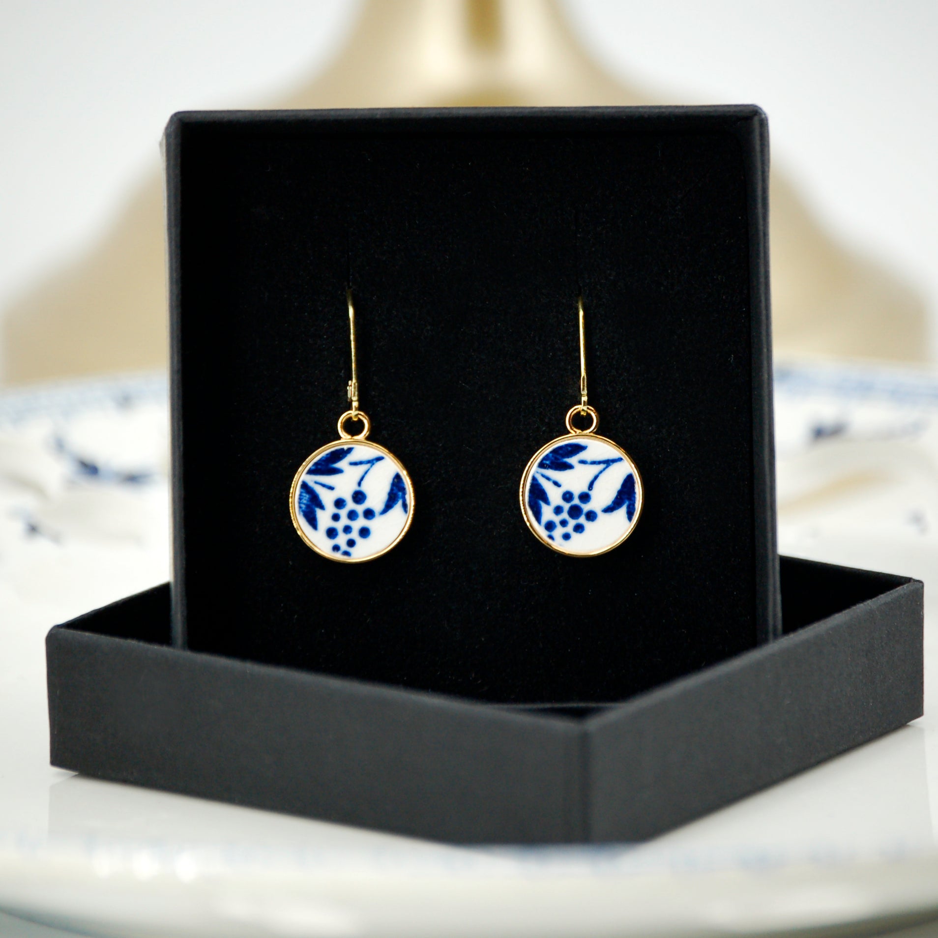 Boucles d'oreilles "Volutes bleues", finition or