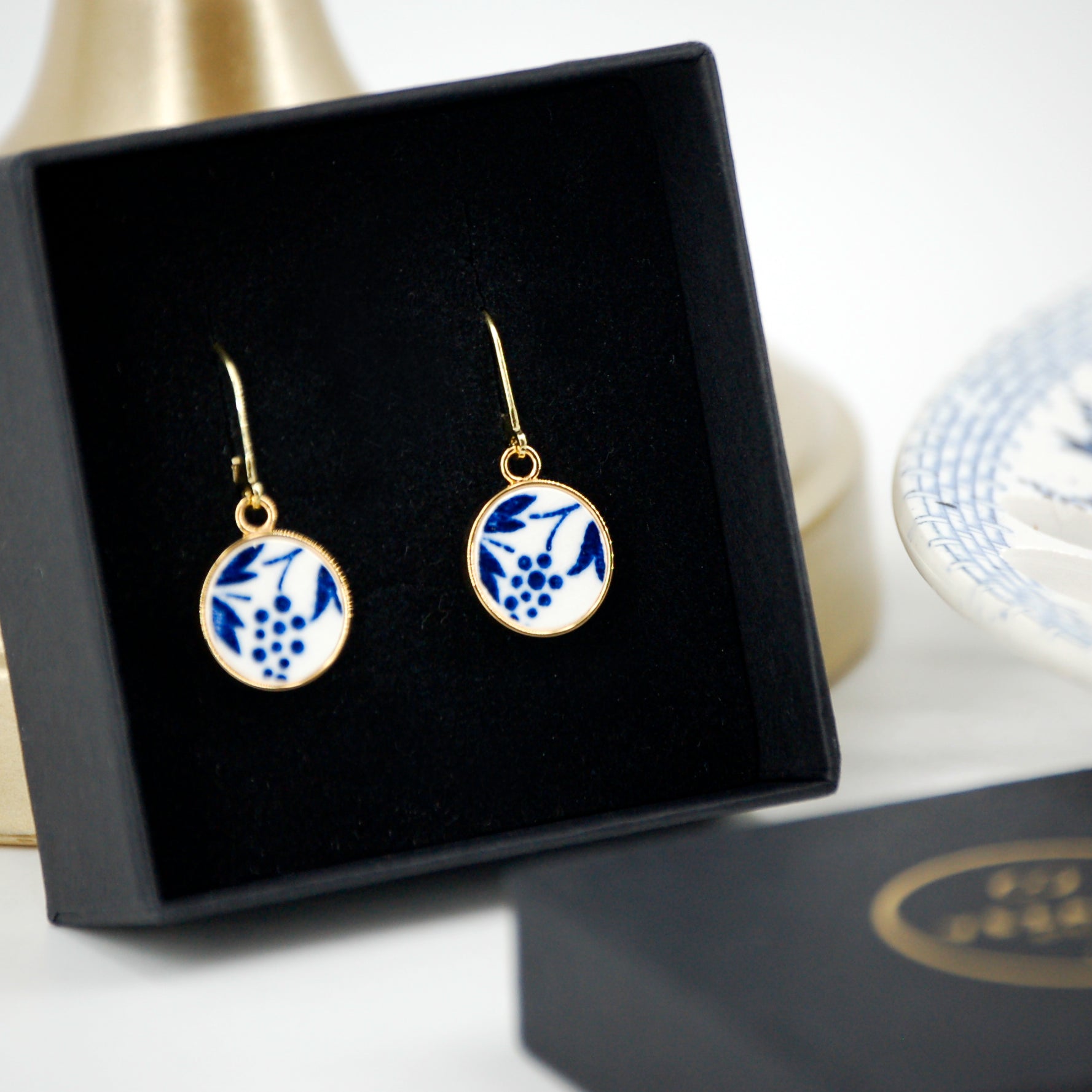Boucles d'oreilles "Volutes bleues", finition or