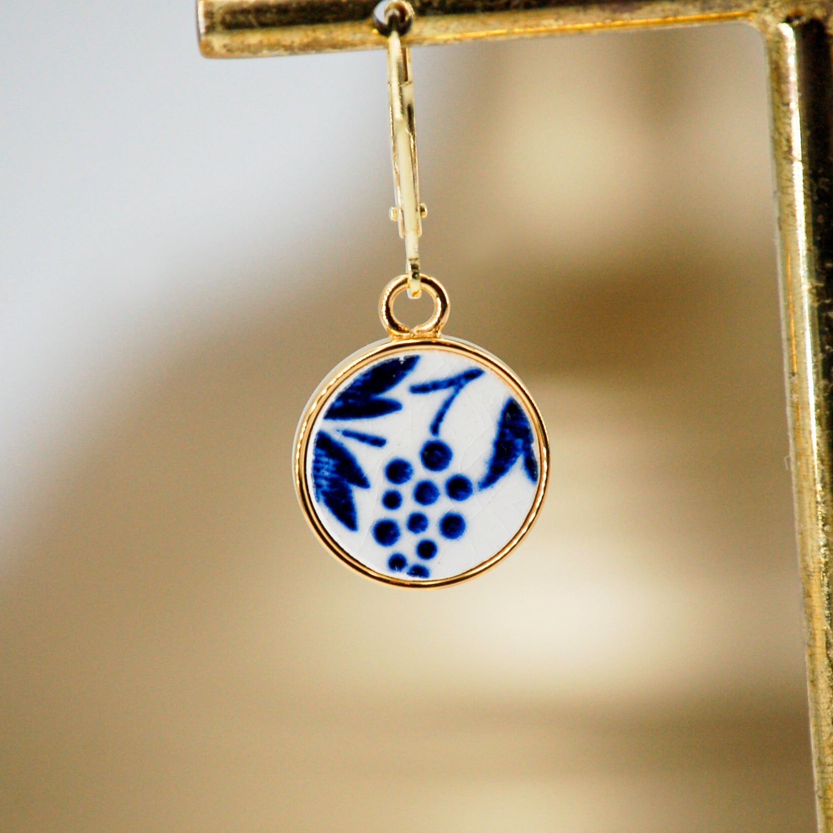 Boucles d'oreilles "Volutes bleues", finition or