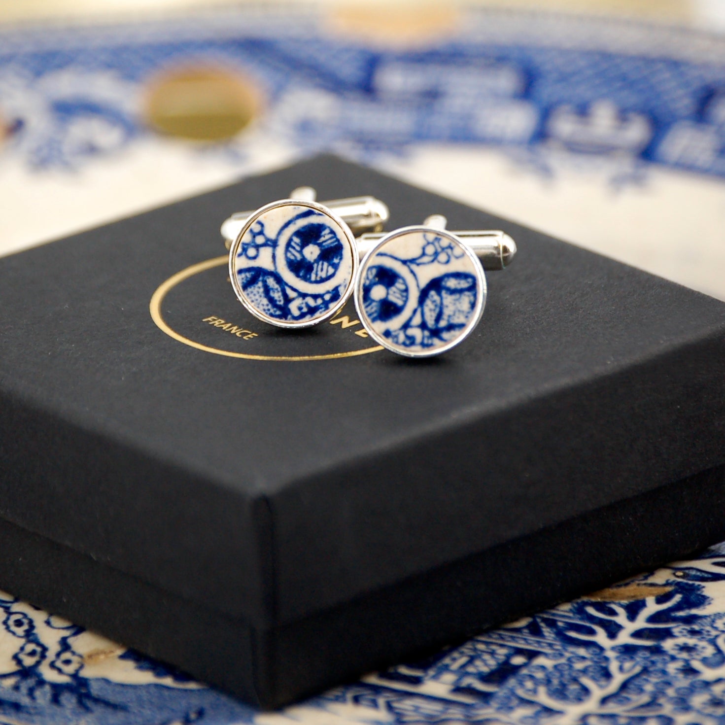 Boutons de manchette "Cercles bleus", finition argent