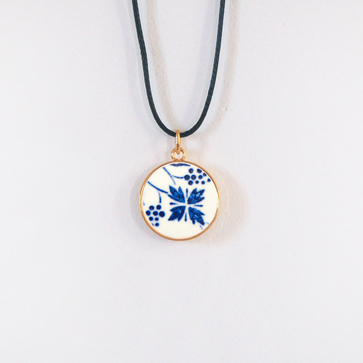 Pendentif "Fleur stylisée", finition or