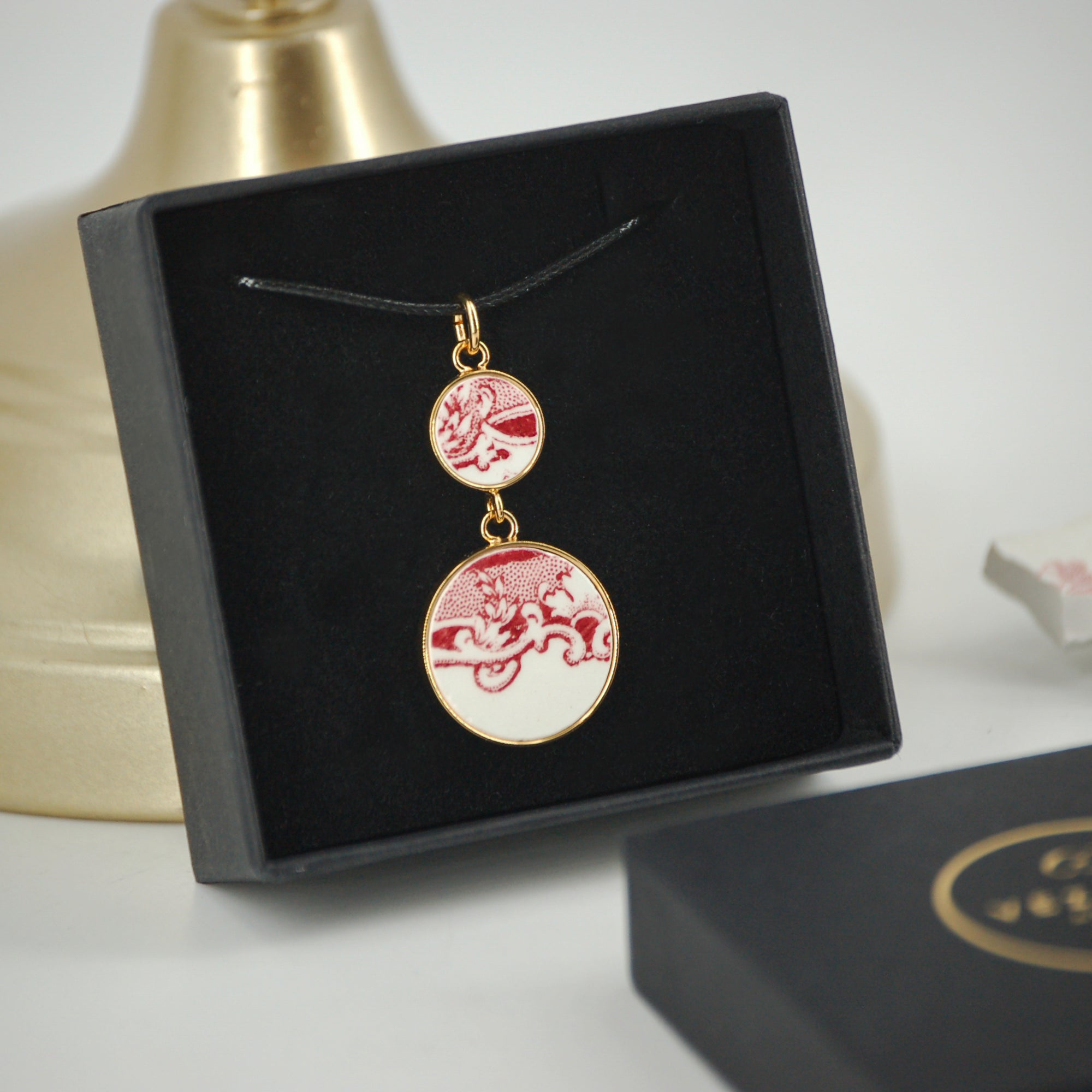 Pendentif "Volutes en vieux rose", finition or