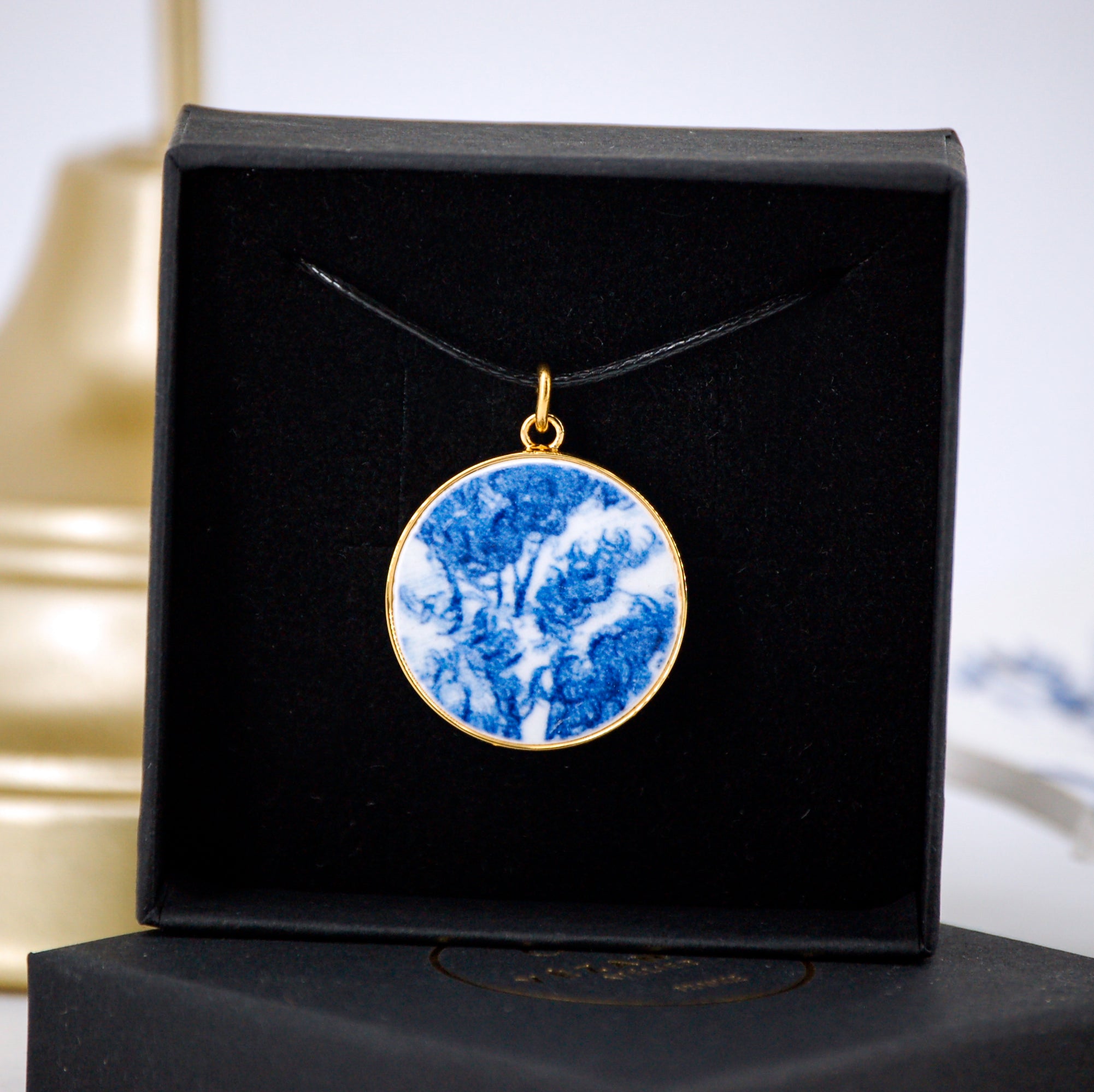 Pendentif "Feuillage bleu", finition or