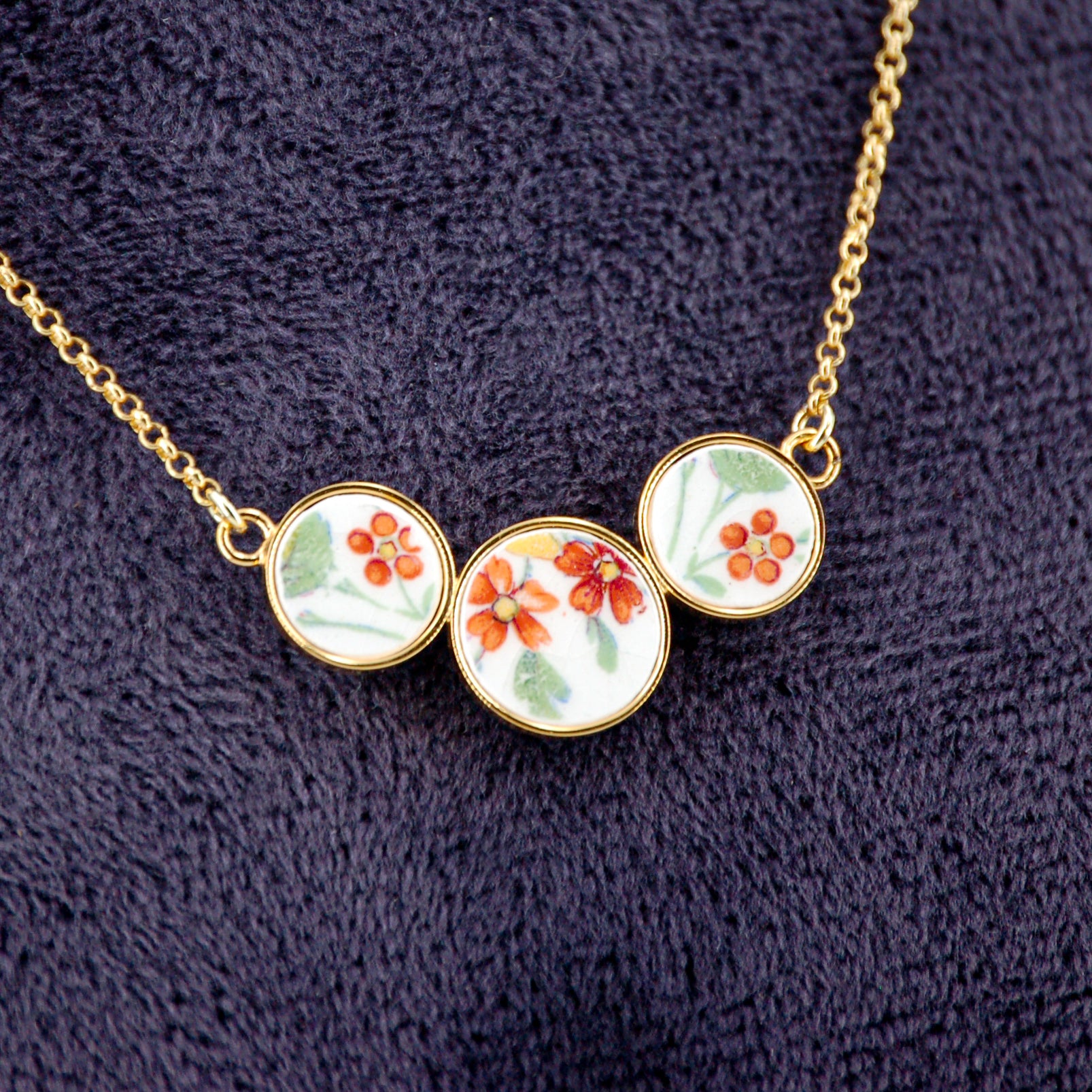 Pendentif "Petites fleurs oranges "